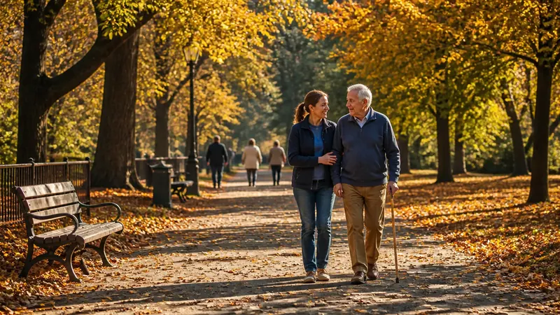 Pflegekraft begleitet einen Senior beim Spaziergang im Park